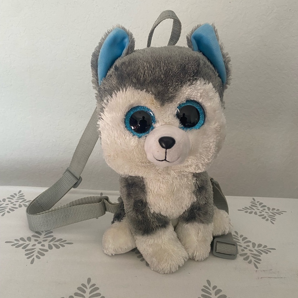 Plush Husky Backpack with Sparkling Blue Eyes